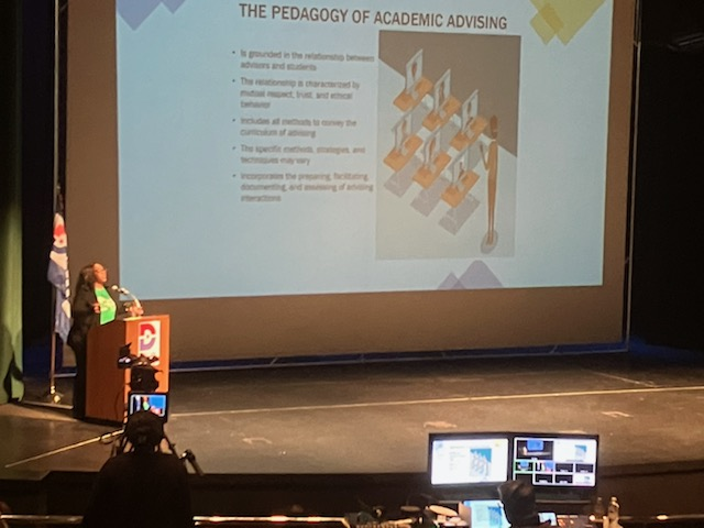 Dr. Camille Smith presenting at a speaking engagement